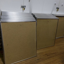Preparing the frames for the 'Pin-up Girls!' Exhibition